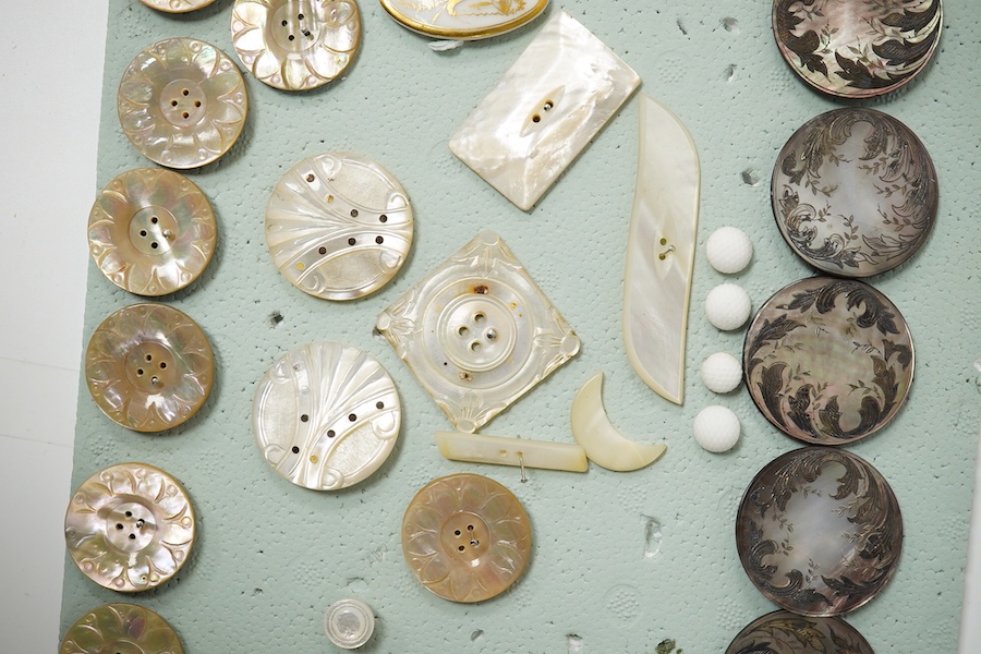 A collection of assorted Victorian and later mother of pearl buttons, largest 40mm. Condition - good